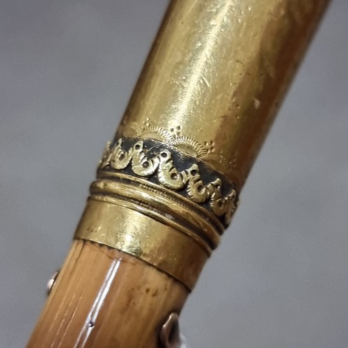 229 - An 18th century gold-topped swagger stick, hallmarked for 1783, maker CM, probably Charles Mappin, w... 