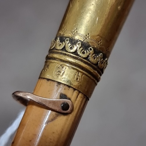 229 - An 18th century gold-topped swagger stick, hallmarked for 1783, maker CM, probably Charles Mappin, w... 