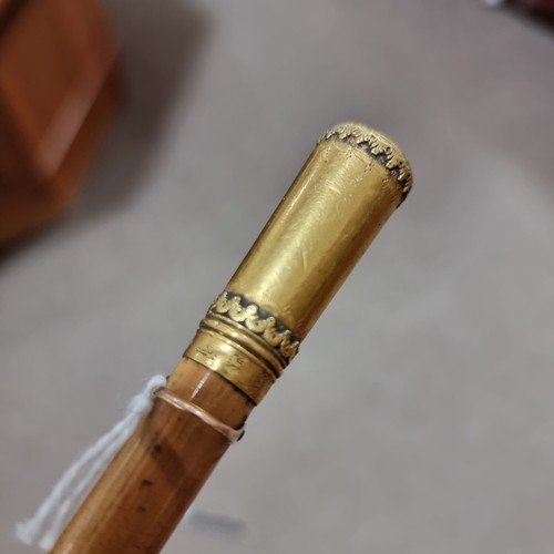 229 - An 18th century gold-topped swagger stick, hallmarked for 1783, maker CM, probably Charles Mappin, w... 