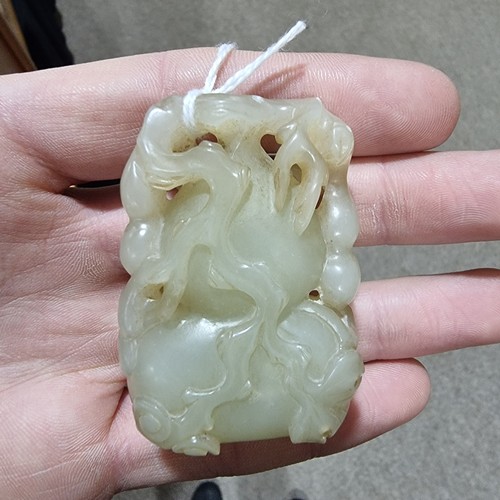 195 - A Chinese relief carved jade double-gourd ornament, height 6cm