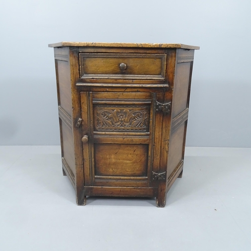 2130 - A Ipswich oak credence cupboard with single door and drawer. 76x75x36cm.