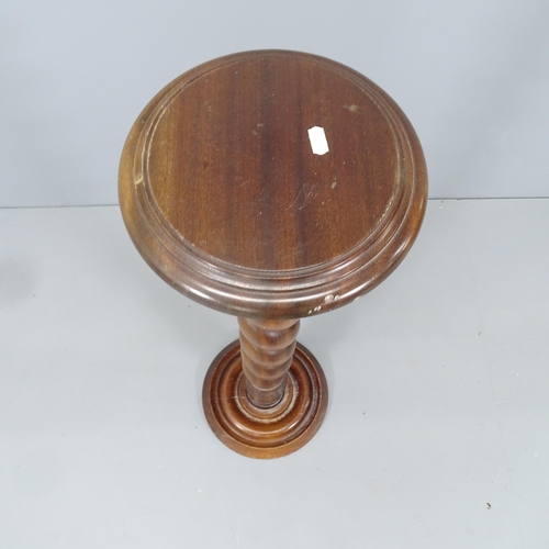 2131 - A mahogany jardiniere stand with spiral turned column. H - 99cm.