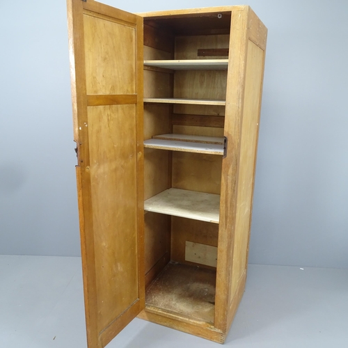 2134 - An early 20th century oak single door locker with shelved interior. 60x172x58cm