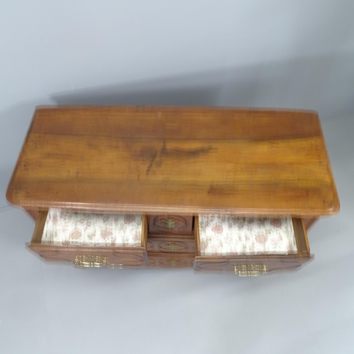 2147 - An antique French walnut commode chest of two short and two long drawers. 114x80x46cm.