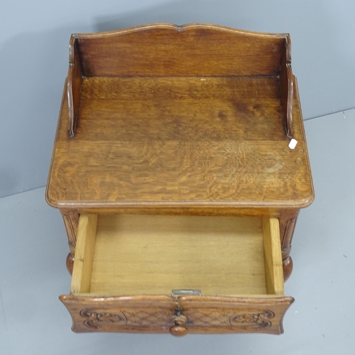 2150 - A pair of French oak bedside tables, with single drawer and raised on cabriole legs. 55x75x40cm