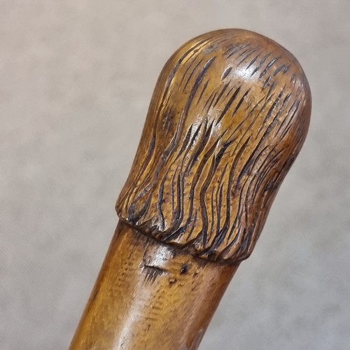 207 - An early 20th Century prisoner of war, possibly Boer War, carved walking cane engraved 