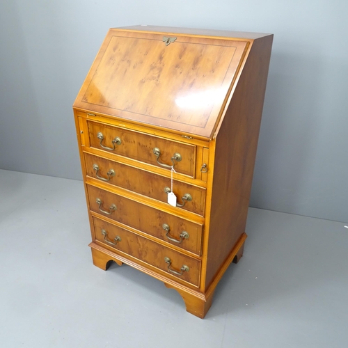 2010 - A modern yew-wood and ebony strung bureau of small form, the fall front revealing a fitted interior ... 