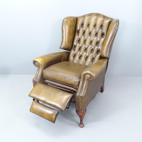 2161 - A button-back leather upholstered reclining armchair. Overall 80x112x90cm, seat 48x50x54cm.