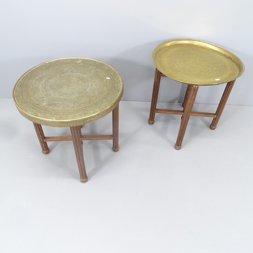 2163 - Two similar eastern brass tray-top tables on folding base. Largest 60x59cm.