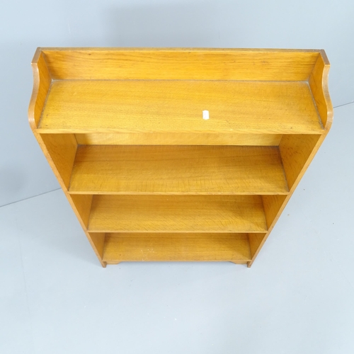 2164 - A small light oak open bookcase. 61x91x17cm