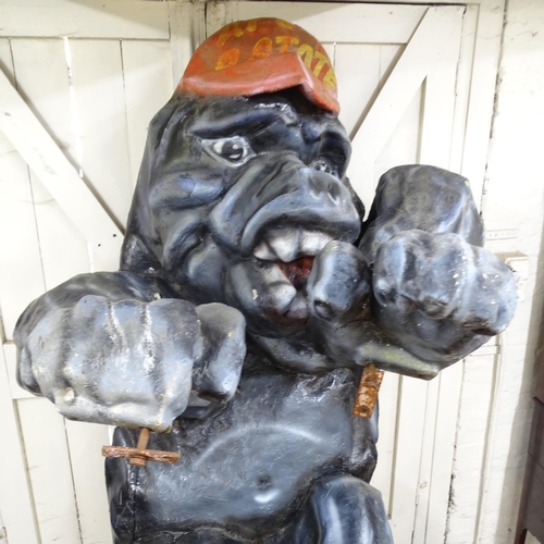 2179 - A large and impressive fibreglass Gorilla wall/roof ornament. Overall approximately 135x250x130cm