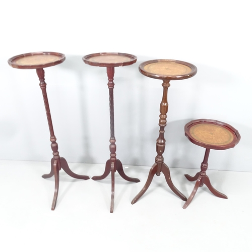 2180 - Four similar mahogany torchere stands. Tallest 30x95cm.