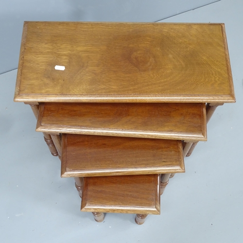 2187 - A modern mahogany quartetto nest of occasional tables. Largest 56x50x25cm.