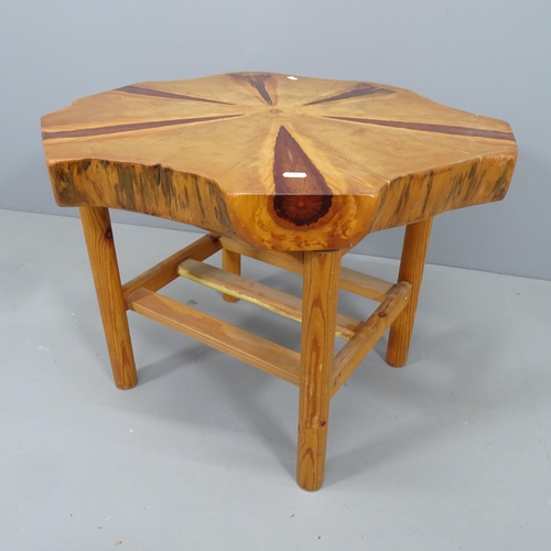 2190 - A live edge tree-slice occasional table. Approx 68x51cm