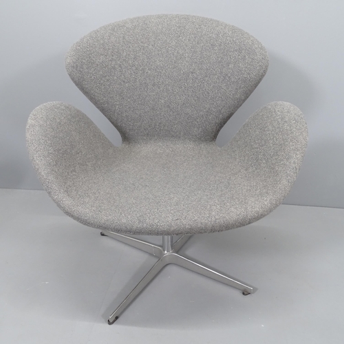 2254 - A mid-century style swivel lounge chair in the manner of the Jacobsen Swan chair. WITH THE OPTION TO... 