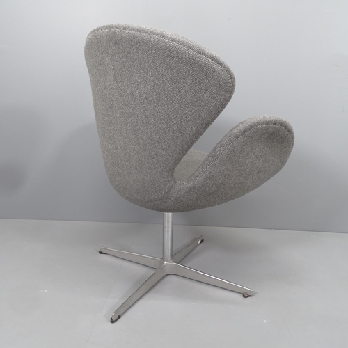 2254 - A mid-century style swivel lounge chair in the manner of the Jacobsen Swan chair. WITH THE OPTION TO... 