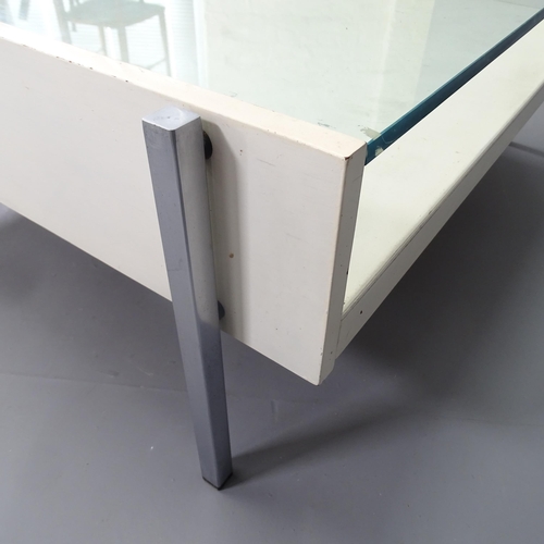 2261 - A mid-century Danish design coffee table, the later painted wood frame on steel legs with inset glas... 