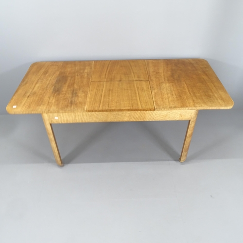 2271 - An Art Deco oak draw-leaf dining table by Heals of London, 130 (extending to 184cm) x74x84cm, and si... 