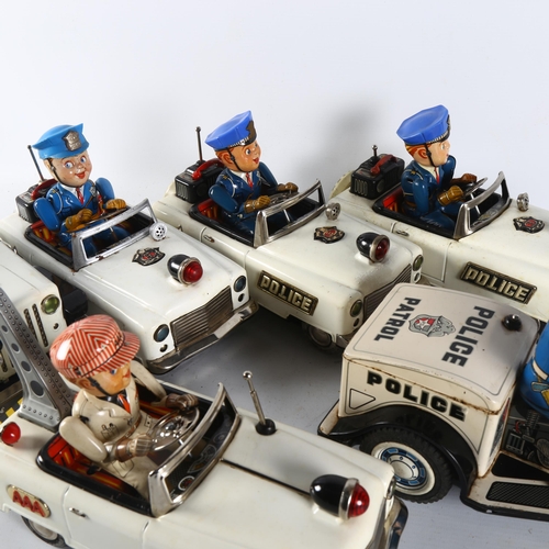 109 - A quantity of Vintage tinplate battery operated Emergency Service vehicles, including a tinplate Pol... 