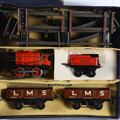 110 - HORNBY - a clockwork O gauge Hornby M1 goods train set, complete in original box