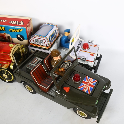 124 - A Vintage tinplate battery operated Fire Chief vehicle, ME699, in original box, a Vintage tinplate b... 