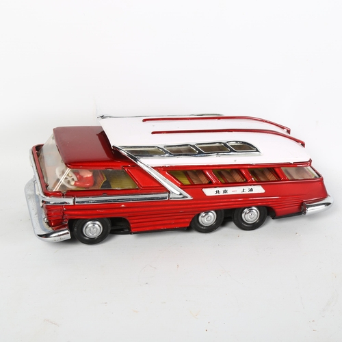 129 - 2 Vintage tinplate battery operated Mystery Action bus vehicles, ref. ME083, unboxed (2)