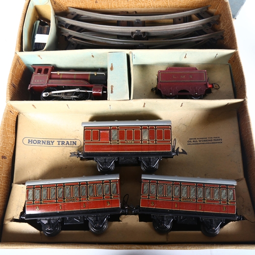 136 - HORNBY - a clockwork Hornby O gauge Hornby train no. 501 passenger set, in original box