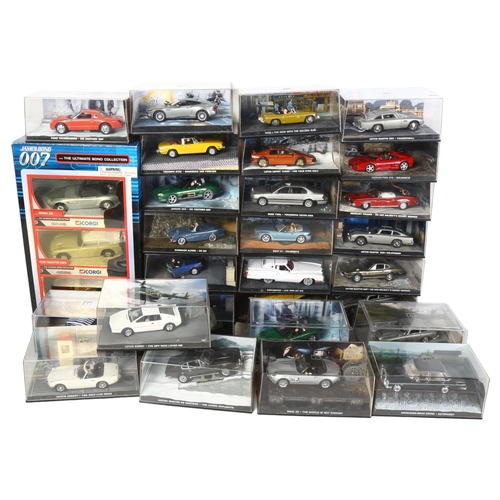 165 - A quantity of James Bond related diecast vehicles, in display cases and original packaging, includin... 