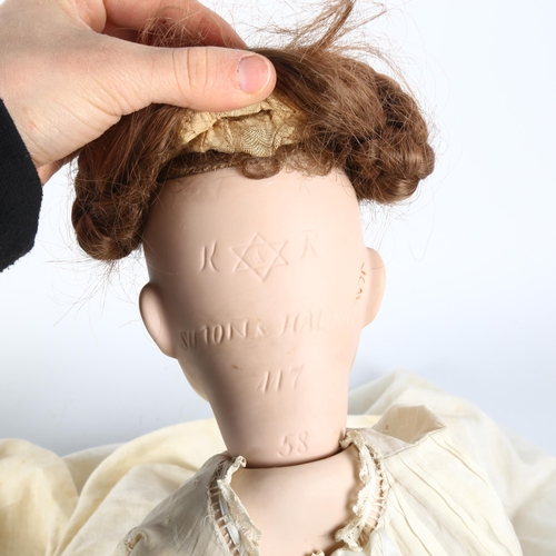 19 - SIMON HALBIG - an Antique bisque-head child's doll, numbers on reverse of head 447, 58, doll length ... 