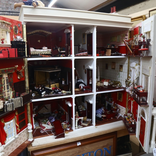 228 - A Regency style doll's house, titled Harbour Wynd, over 3 floors with fitted interior, includes vari... 