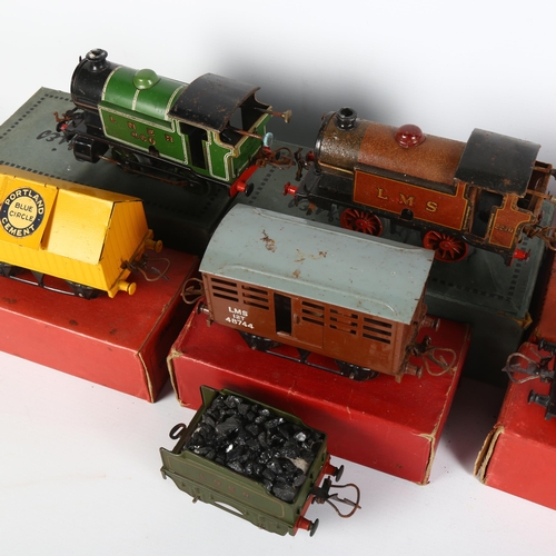23 - HORNBY - a quantity of boxed and loose Hornby O gauge locomotives and goods wagons, including O gaug... 