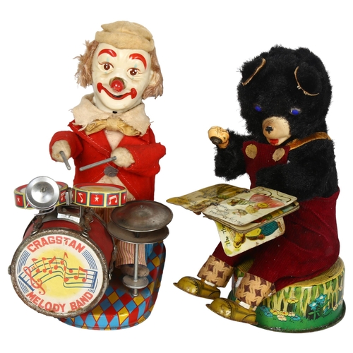 236 - CRAGSTAN - a battery operated tinplate clown jazz band, likely 1960s, and a Cragstan book reading ba... 