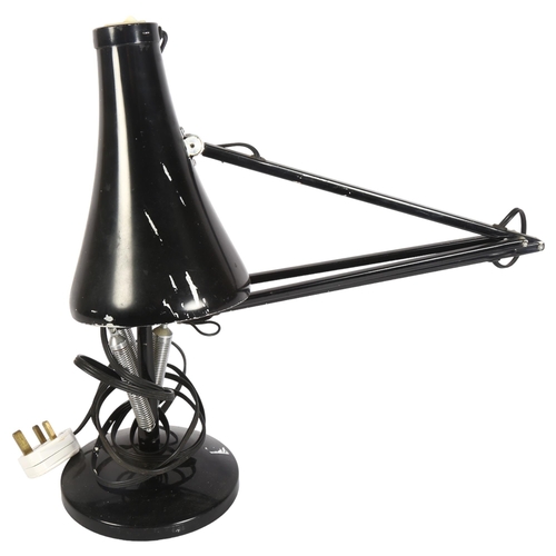 282 - HERBERT TERRY - a mid-century black anglepoise lamp on circular base, stamped to the bottom of the s... 