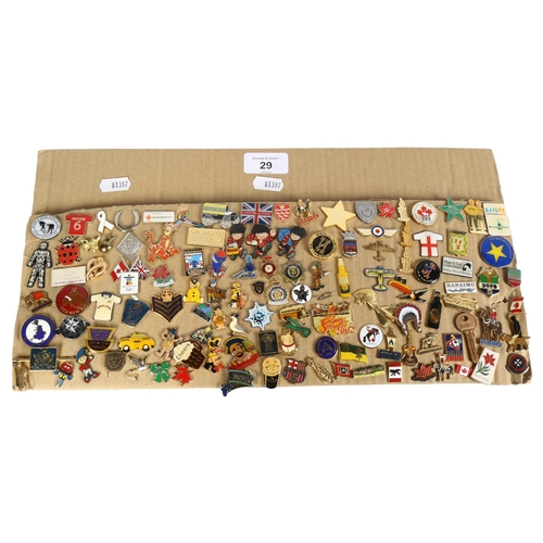 29 - A large collection of various badges, including Black Rat Polegate Traffic Police, Rupert the Bear, ... 