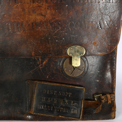 296 - Maidstone & District Motor Services Ltd, an early 20th century leather satchel, Hastings Tramways Co... 