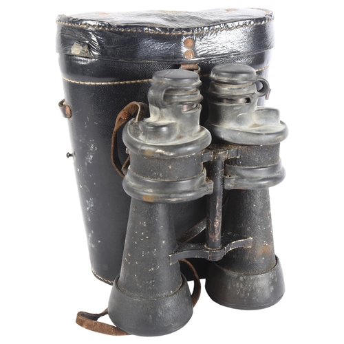 323 - KREIGSMARINE - pair of World War II Period armoured binoculars, marked 7x50 beh 457434, with rubbed ... 