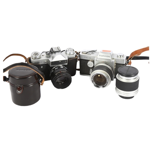 324 - A Zenit-E camera with a Helios-44-2 lens, a Topcon RE-2 camera and lens case, and an RE-auto Top Cor... 