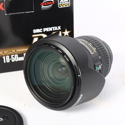 330 - A Pentax 16-50mm F2.ATD camera lens (works in auto focus but not manual focus), boxed