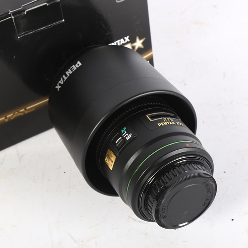 332 - A Pentax DA200mm F2.8ED lens, boxed, working order