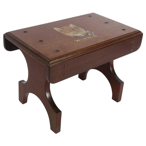 334 - A small early 20th century mahogany stool, with painted cat decoration 