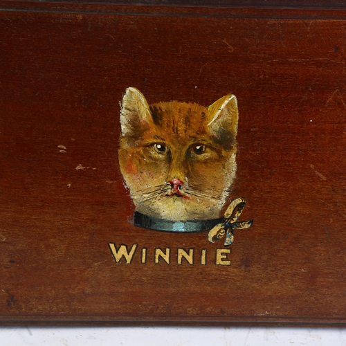 334 - A small early 20th century mahogany stool, with painted cat decoration 