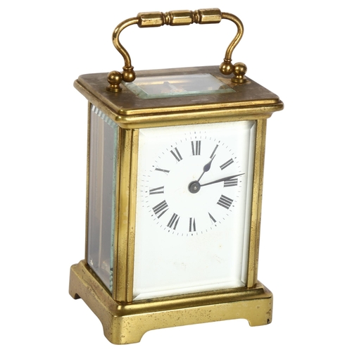 387 - A French brass-cased carriage clock, white enamel dial with Roman numeral hour markers, case height ... 