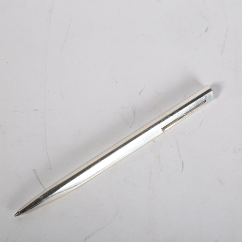 394 - BULGARI - a polished metal Excentrique ballpoint pen, triangular profile, length 14cm, cased