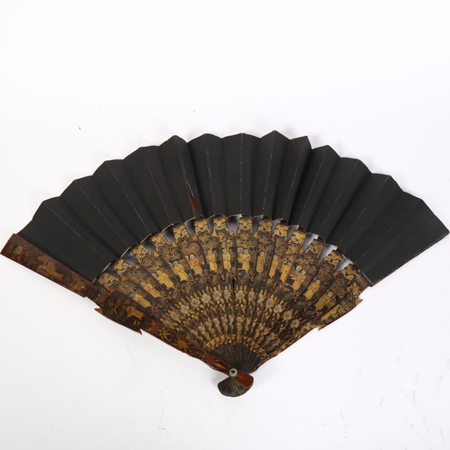 409 - A Chinese Mandarin gilded black lacquer mourning fan, circa 1880, length 28.5cm