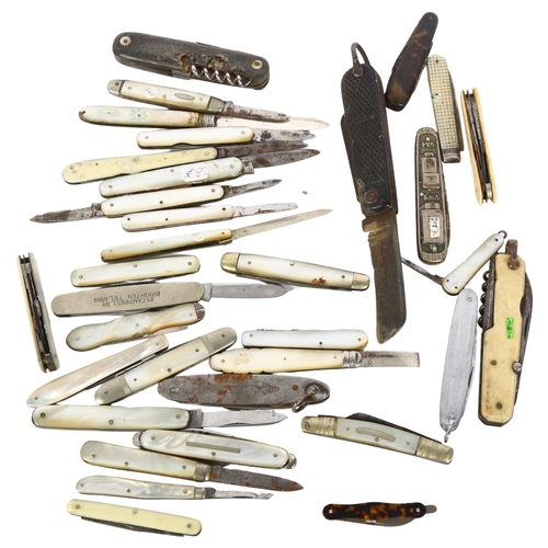 442 - A quantity of mother-of-pearl fruit knives, multi-tool knives, including some silver