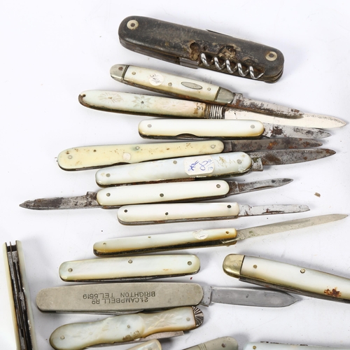 442 - A quantity of mother-of-pearl fruit knives, multi-tool knives, including some silver