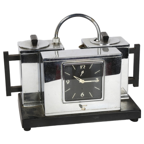 446 - A mid-century Teasmade style base-metal teapot alarm clock, untested, height 23cm