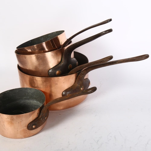 447 - A selection of 5 French copper pans, largest diameter 21cm