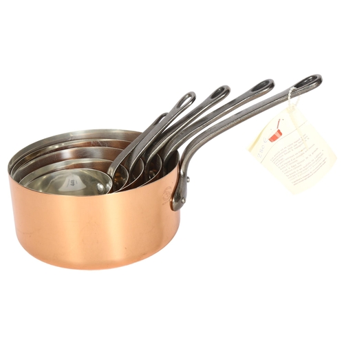 448 - A graduated set of 5 French copper kitchen pots, with original display label, largest diameter 18cm