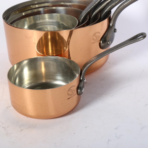 448 - A graduated set of 5 French copper kitchen pots, with original display label, largest diameter 18cm